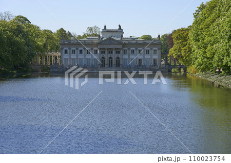 Scenic palace on isle at lake in baths park in Warsaw city in Poland 110023754