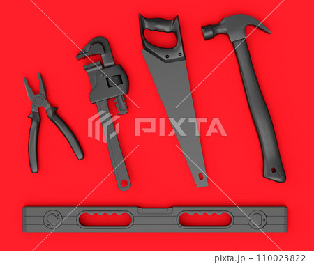 Top view of monochrome construction tools for repair on red background 110023822