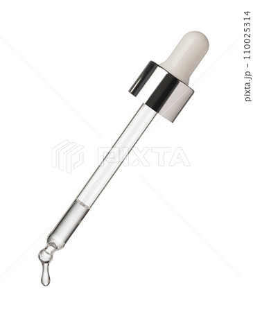 Drop of serum falls from glass pipette Drop of serum falls from glass pipette 110025314