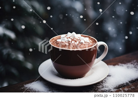 hot chocolate cup in winter with snow hot chocolate cup in winter with snow 110025778