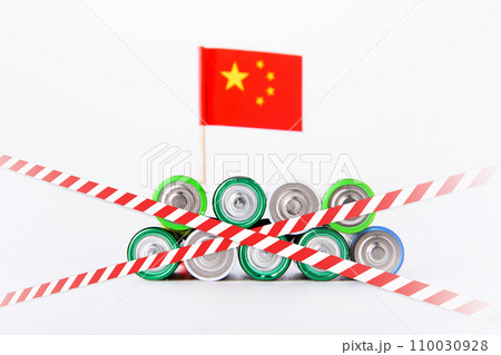 Battery. A lot of batteries on the background of the flag of the country. Battery. A lot of batteries on the background of the flag of the country. 110030928