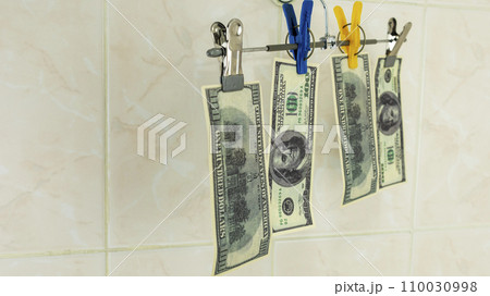 $ 100 bills are dried on a string $ 100 bills are dried on a string 110030998