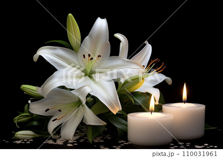 White lilies and burning candles White lilies and burning candles 110031961