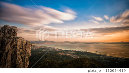 Sunset overlooking Nago city Okinawa Sunset overlooking Nago city Okinawa 110034419