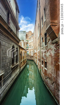 Canals of Venice Italy at sunset 110034445