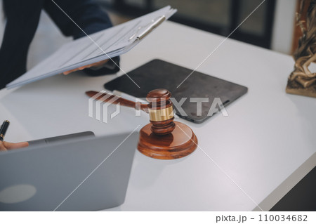 Lawyer, legal advisor, businessman brainstorming information on agreement details Business contracts in legal processing books for accuracy in contract documents. joint financial investment. Lawyer, legal advisor, businessman brainstorming information on agreement details Business contracts in legal processing books for accuracy in contract documents. joint financial investment. 110034682