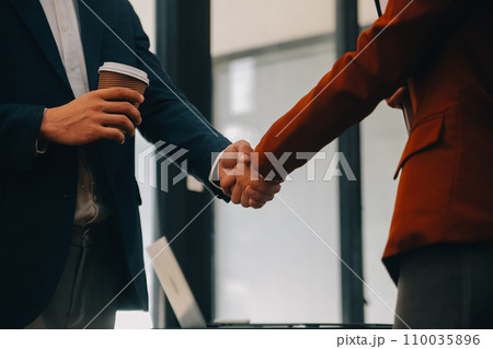 Business handshake for teamwork of business merger and acquisition,successful negotiate,hand shake,two businessman shake hand with partner to celebration partnership and business deal concept Business handshake for teamwork of business merger and acquisition,successful negotiate,hand shake,two businessman shake hand with partner to celebration partnership and business deal concept 110035896