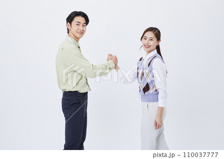collaborative business man and woman photo holding hands 110037777