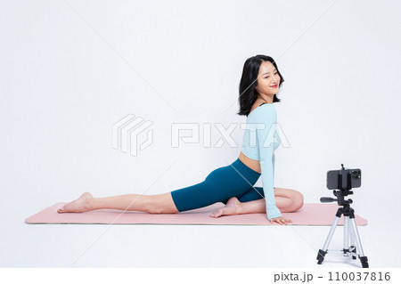 healthy beauty stretching motion a female photo image taken with a smartphone 110037816