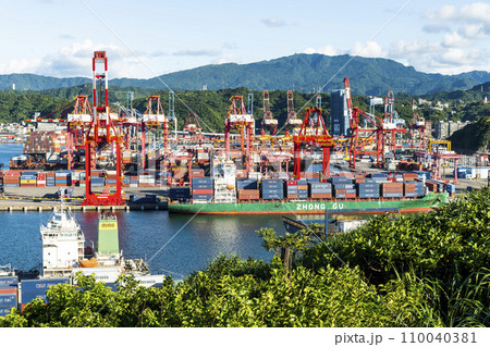 The container ship docked at the port of Keelung, Taiwan for loading. The container ship docked at the port of Keelung, Taiwan for loading. 110040381