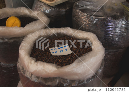 Bags of premium kampot black pepper sold in Samaki Market, a famous export product from Kampot Cambodia Bags of premium kampot black pepper sold in Samaki Market, a famous export product from Kampot Cambodia 110043785