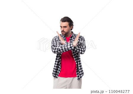 young smart brunette caucasian man with stylish hairstyle and beard wants to show stop and cross 110048277