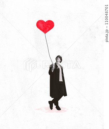 Poster. Contemporary art collage. Young charming man in black and white filter holds painted balloon that will give to his beloved. 110048701