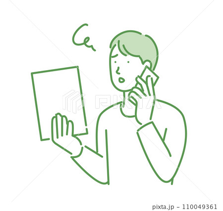 書類の不備を確認する男性 110049361