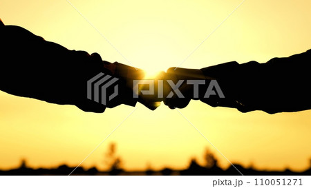 beat fists, raise hands up sunset silhouette, successful concept business people, teamwork, business strength, plan confirmation success, sign symbol success agreeing, mutual agreement work, goal beat fists, raise hands up sunset silhouette, successful concept business people, teamwork, business strength, plan confirmation success, sign symbol success agreeing, mutual agreement work, goal 110051271