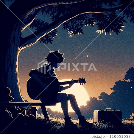 夕暮れ時木の下でギターを弾く男の人 110053058
