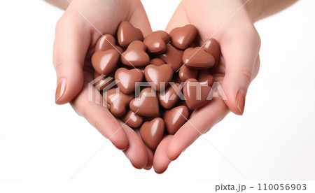 小さなハートのチョコを持つ女性の手 /AI生成 小さなハートのチョコを持つ女性の手 /AI生成 110056903