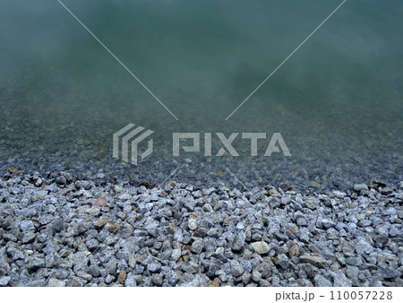 Small Gravel And Water Of Pond Bank Small Gravel And Water Of Pond Bank 110057228