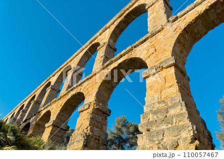 Roman aqueduct Devils Bridge at Sunset. Tarragona, Catalonia, Spain. Roman aqueduct Devils Bridge at Sunset. Tarragona, Catalonia, Spain. 110057467