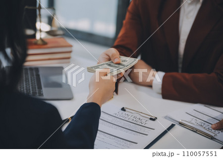 Lawyer, legal advisor, businessman brainstorming information on agreement details Business contracts in legal processing books for accuracy in contract documents. joint financial investment. Lawyer, legal advisor, businessman brainstorming information on agreement details Business contracts in legal processing books for accuracy in contract documents. joint financial investment. 110057551