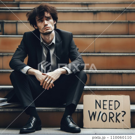 Man in suit sitting at stairs with sign. Unemployed man looking for job Man in suit sitting at stairs with sign. Unemployed man looking for job 110060110