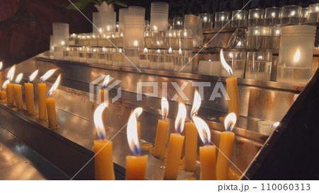 Candles are lit in the Catholic Church. 110060313