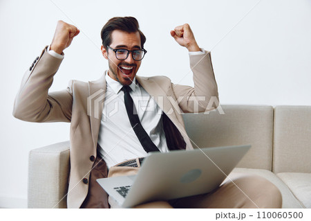 Home man sofa business video laptop call Home man sofa business video laptop call 110060500