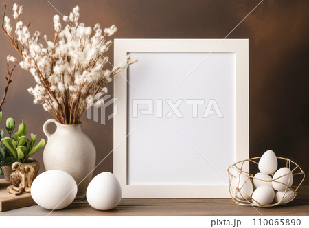 Photo frame mockup on wooden table with candles and flowers in interior 110065890