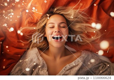 Young blonde woman having orgasm. Beautiful woman with open mouth and closed eyes enjoying sex lying among fireworks. Sparklers as a symbol of orgasm. Sexual experience, masturbation, cunnilingus. Young blonde woman having orgasm. Beautiful woman with open mouth and closed eyes enjoying sex lying among fireworks. Sparklers as a symbol of orgasm. Sexual experience, masturbation, cunnilingus. 110066628