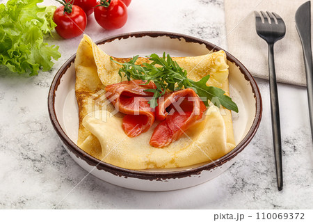 Russian pancake with salmon fish Russian pancake with salmon fish 110069372