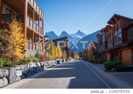 Walking trail in residential area. Town of Canmore street view in fall season. Alberta, Canada. 110070530