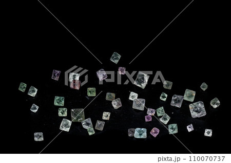 macro mineral fluorite stone on balck background macro mineral fluorite stone on balck background 110070737