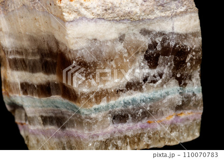 Macro stone mineral Fluorite on a black background Macro stone mineral Fluorite on a black background 110070783