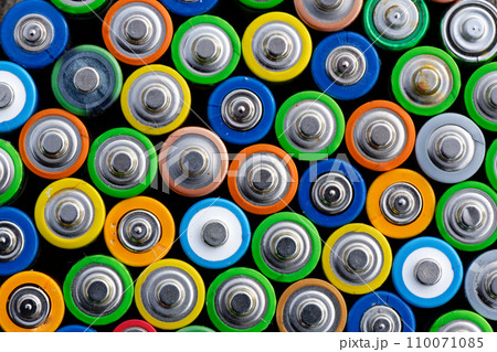 Old used batteries. Batteries background Old used batteries. Batteries background 110071085
