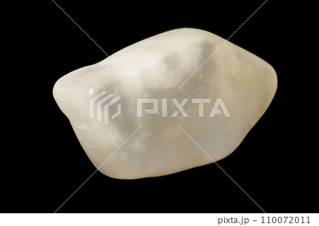 Macro stone mineral Ulexite on a black background Macro stone mineral Ulexite on a black background 110072011
