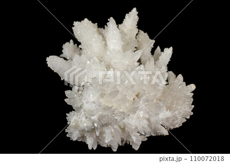 Macro stone Calcite mineral on a black background 110072018