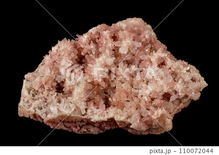 Macro stone mineral pink quartz amethyst on a black background 110072044