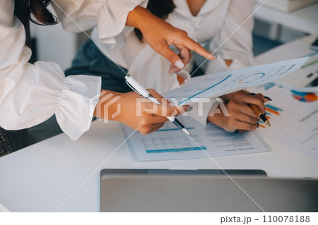 Business team collaboration discussing working analyzing with financial data and marketing growth report graph in team, presentation and brainstorming to strategy planning making profit of company. 110078188