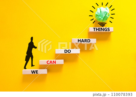 We can do hard things symbol. Concept words We can do hard things on wooden blocks. Beautiful yellow table yellow background. Businessman icon. Business, we can do hard things concept. Copy space. We can do hard things symbol. Concept words We can do hard things on wooden blocks. Beautiful yellow table yellow background. Businessman icon. Business, we can do hard things concept. Copy space. 110078393
