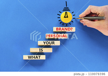 What is your personal brand symbol. Concept words What is your personal brand on wooden blocks. Beautiful blue background. Businessman hand. Business, what is your personal brand concept. Copy space. What is your personal brand symbol. Concept words What is your personal brand on wooden blocks. Beautiful blue background. Businessman hand. Business, what is your personal brand concept. Copy space. 110078396