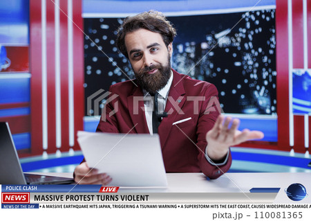 Newscaster covers protest news topic, talking about massive demonstration with crowd of people on strike. Journalist presenting report about violent community protesting, live talk show. Newscaster covers protest news topic, talking about massive demonstration with crowd of people on strike. Journalist presenting report about violent community protesting, live talk show. 110081365