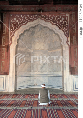 People praying at the Jama Masjid Mosque in Delhi, India People praying at the Jama Masjid Mosque in Delhi, India 110089404