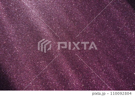 Oblique rays of light on a purple lilac surface. Bokeh, dust particles, reflection magical glow. Festive shining background. New Year, Christmas, birthday. Plastic card design. Cosmic photons space Oblique rays of light on a purple lilac surface. Bokeh, dust particles, reflection magical glow. Festive shining background. New Year, Christmas, birthday. Plastic card design. Cosmic photons space 110092804