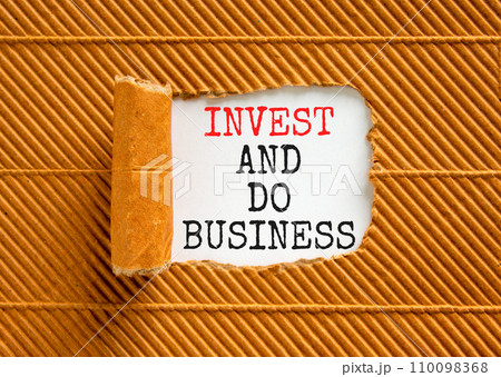 Invest and do business symbol. Concept word Invest and do business on beautiful white paper. Beautiful brown paper background. Invest and do business concept. Copy space. Invest and do business symbol. Concept word Invest and do business on beautiful white paper. Beautiful brown paper background. Invest and do business concept. Copy space. 110098368