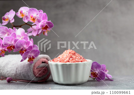 Beautiful blooming orchid flowers and pink sea salt. Beautiful blooming orchid flowers and pink sea salt. 110099661