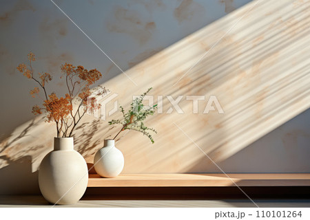 Ceramic vases on the shelf and vase with flowers at beige wall with sun shadows Ceramic vases on the shelf and vase with flowers at beige wall with sun shadows 110101264