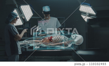 Surgeons in AR headsets perform surgery in operating room using AI 110102493