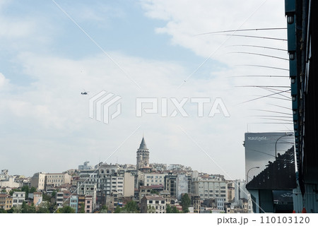Galata Tower in Istanbul - Cityscape and Fishing Rods in Foreground 110103120