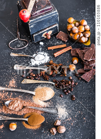 Sweet spices and chocolate on a table 110103886