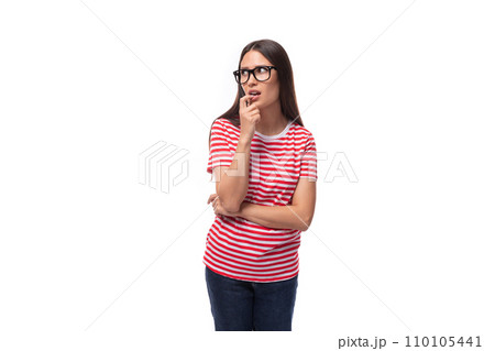 pretty 35 year old european lady in a red striped t-shirt wears glasses for vision correction on a 110105441